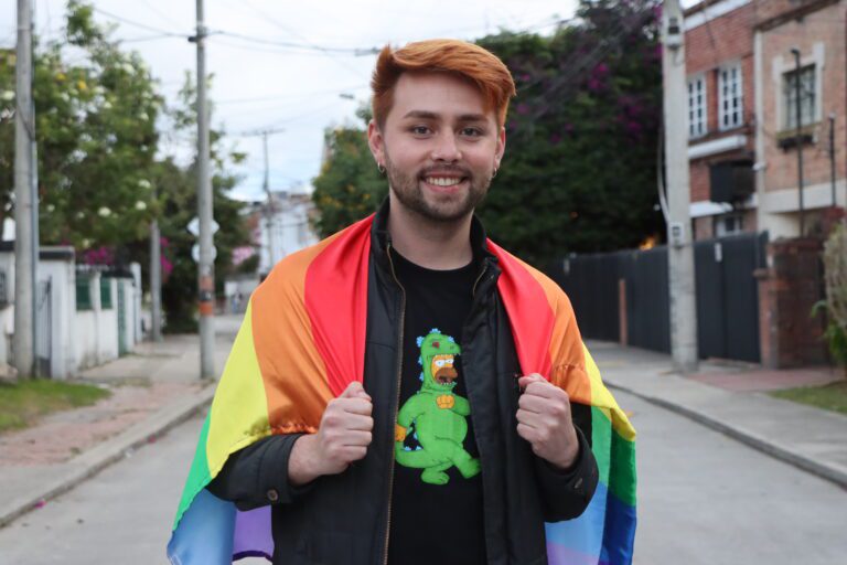 Image of person with Pride flag