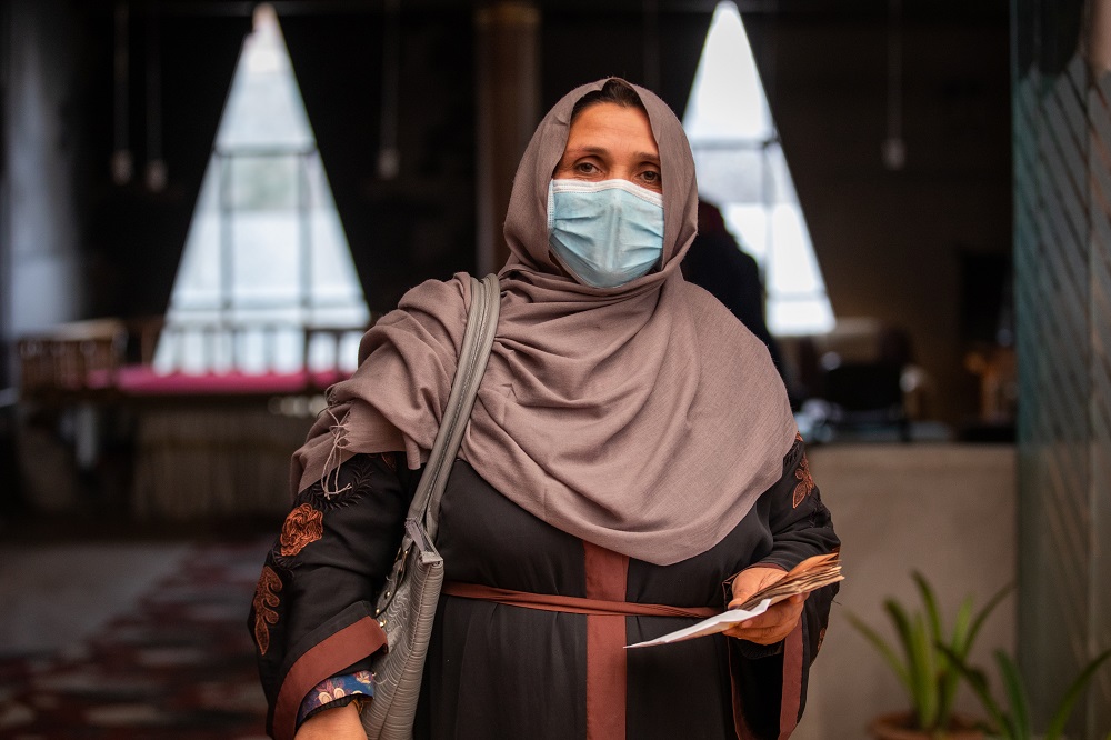 November 16, 2021— Noor* receives a cash distribution from the International Rescue Committee (IRC). The IRC is providing displaced families in Kabul with emergency cash assistance to help them prepare for the coming winter and enable them to meet their basic needs.