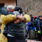 What can help refugees process traumatic grief?