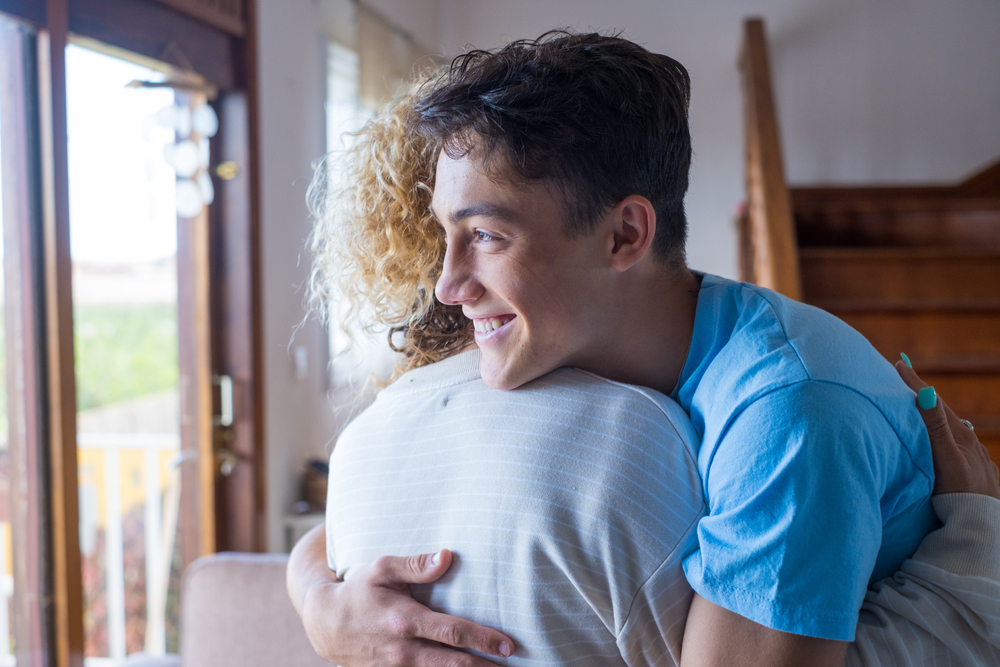 Loving,Teenager,Smiling,Enjoy,Moment,Strong,Cuddles,Adult,Mom,After