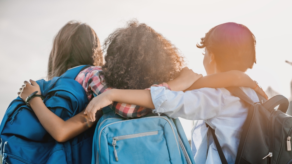 Rear,View,Of,Multiethnic,Elementary,Middle,School,Kids,Pupils,Classmates