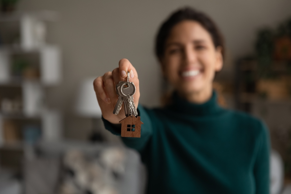 First,Time,Home,Buyer.,Blurred,Portrait,Of,Overjoyed,Young,Latin