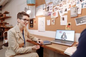Woman at a laptop during an English language lesson