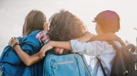 Rear,View,Of,Multiethnic,Elementary,Middle,School,Kids,Pupils,Classmates